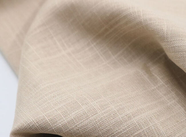 Vải linen xước có đặc trưng là các vết xước trên bề mặt vải