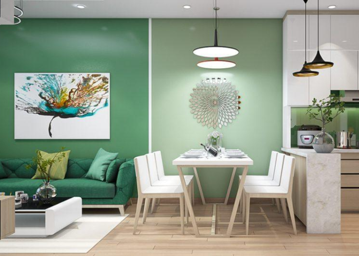 Kết hợp nhiều gam màu xanh lá khác nhau để tạo nên vẻ đẹp thu hút và ấn tượng cho gian phòng khách và bếp liền kề