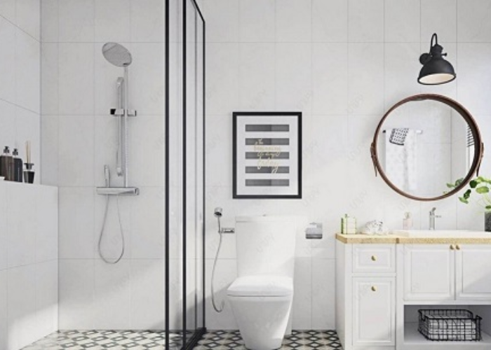 Vách kính kết hợp tông màu sáng cho phòng tắm thêm rộng rãi