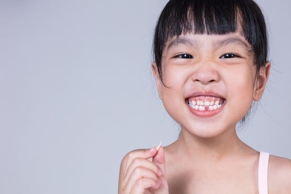 Sự khác biệt giữa niềng răng cho người lớn và niềng răng cho trẻ em - Ảnh 6