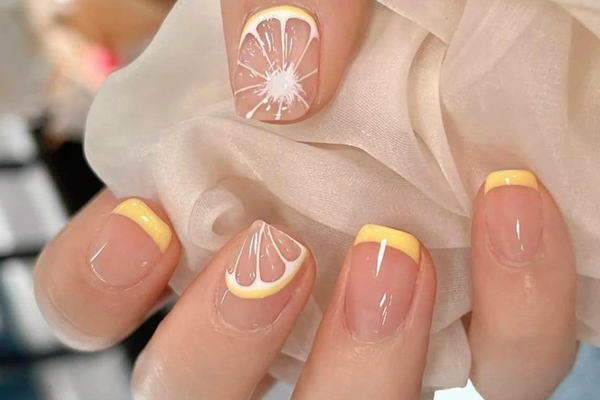 Mẫu nail sơn gel với họa tiết trông như một tép cam đầy ấn tượng (Nguồn: Internet)

