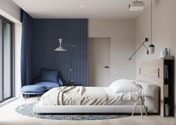 Mẫu phòng ngủ với góc tường và bộ bàn ghế màu xanh navy được trang trí đơn giản nhưng vẫn tạo điểm nhấn nổi bật (Nguồn: Internet)