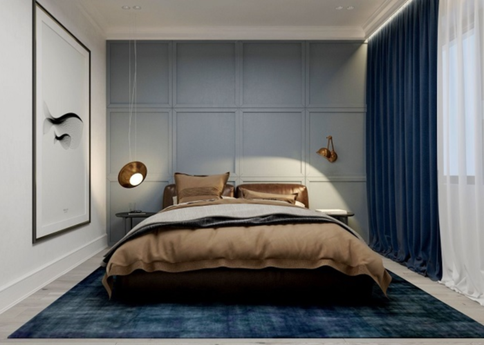 Phòng ngủ được trang trí thảm, rèm màu xanh dương kết hợp bộ ra giường nâu tạo cảm giác ấm áp (Nguồn: Internet)