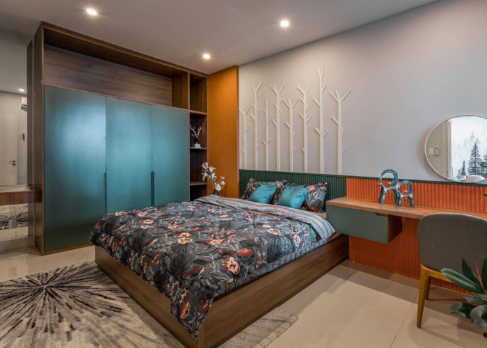 Mẫu 7: Phòng ngủ với tủ đựng đồ màu xanh cổ vịt như hòa cùng sắc màu thiên nhiên kết hợp với điểm nhấn là chiếc ga giường cách điệu. 