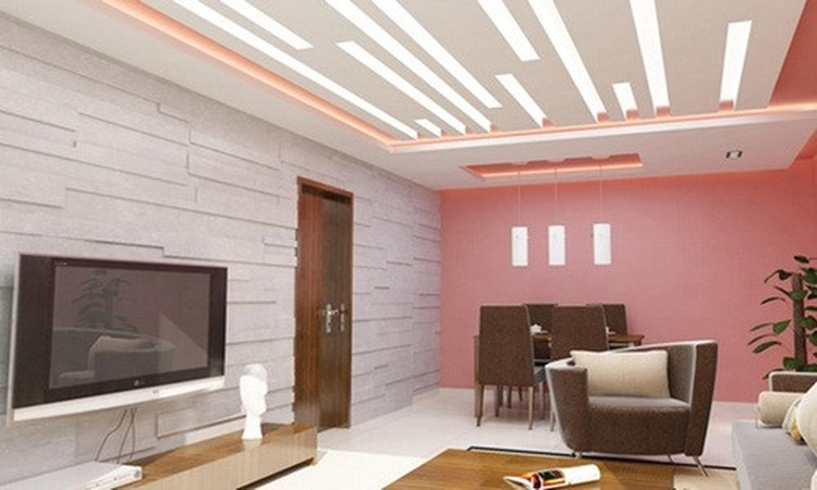 Mẫu trần thạch cao phòng khách với tông màu hồng ấn tượng (Nguồn: Internet)