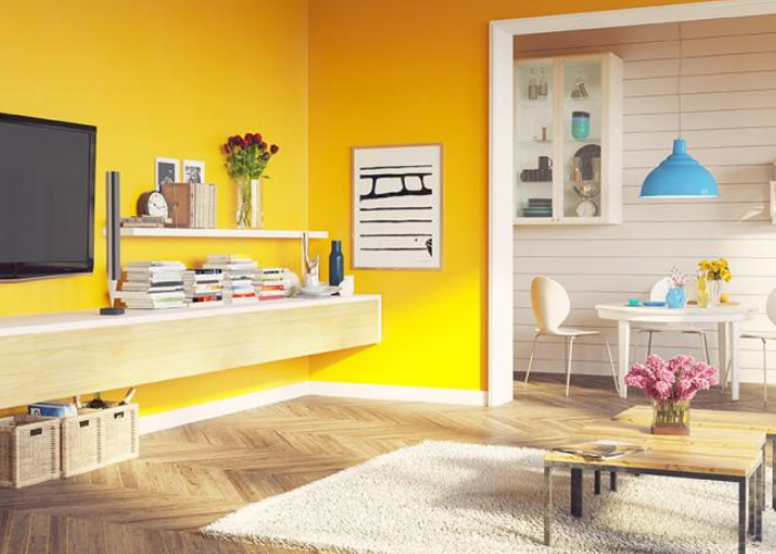 Sử dụng những món đồ nội thất có màu gỗ nhạt để tạo nên vẻ đẹp hòa hợp với phòng khách tone vàng