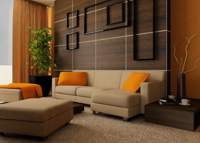 Một bộ sofa màu cà phê sẽ làm nổi bật vẻ đẹp hiện đại của phòng khách có màu chủ đạo là màu nâu trầm