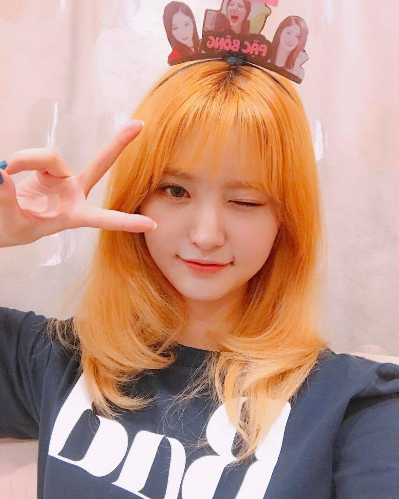 tóc màu cam san hô và màu cam pastel